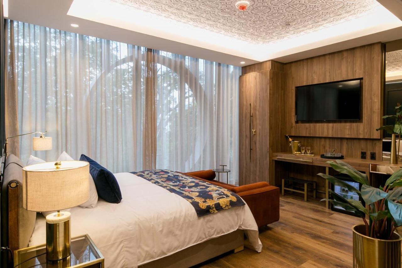 Hotel Marquee Medellín Zewnętrze zdjęcie A bedroom at the hotel